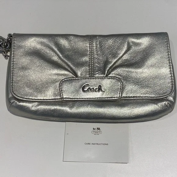 Coach Wristlet in Silver/Gold Depending on Lighting - Picture 9 of 13